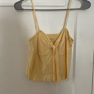 Yellow front tie John gault